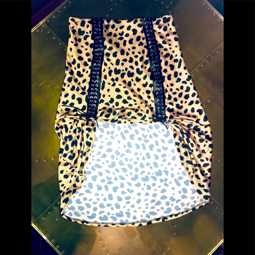 Silky Cheetah Print, Cinched with Leather Lacing.